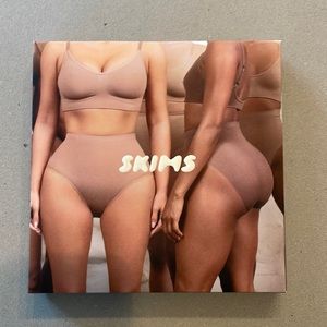 SKIMS sculpting mid waist thong